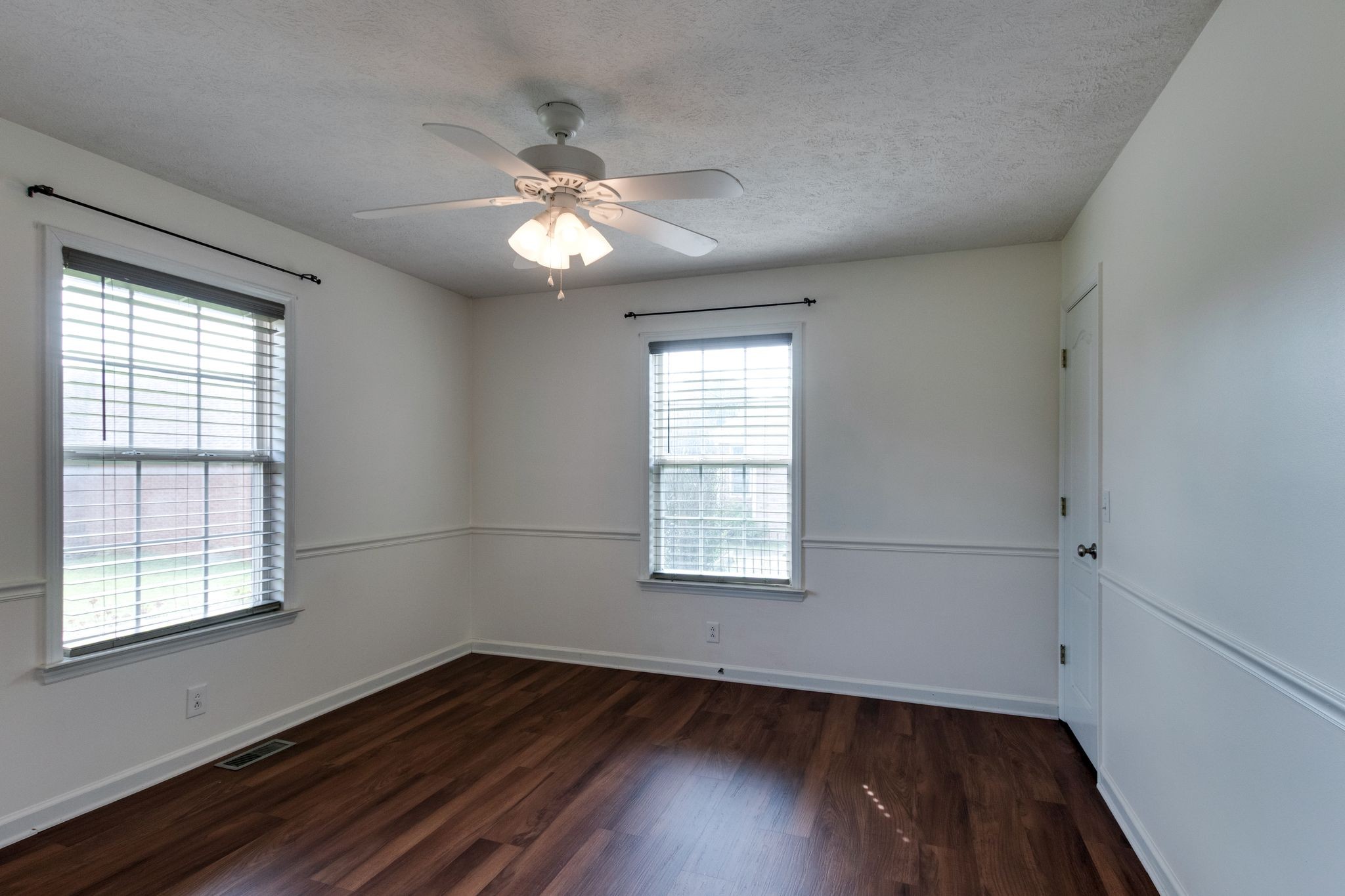 807 Judson Close Murfreesboro, TN 37130 - Photo 19 of 31 a view of an empty room with wooden floor and a window