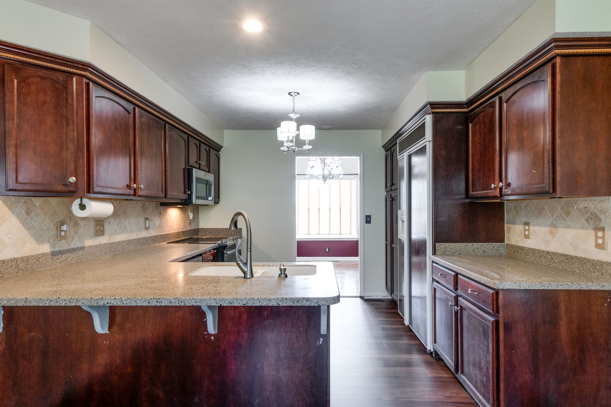 807 Judson Close Murfreesboro, TN 37130 - Photo 8 of 31 a kitchen with stainless steel appliances granite countertop a sink stove and cabinets