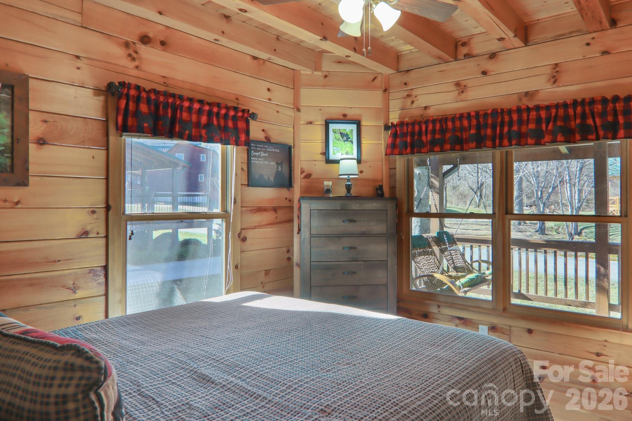 54 Meandering Way Maggie Valley, NC 28751 - Photo 14 of 47 a bedroom with a bed and a dresser