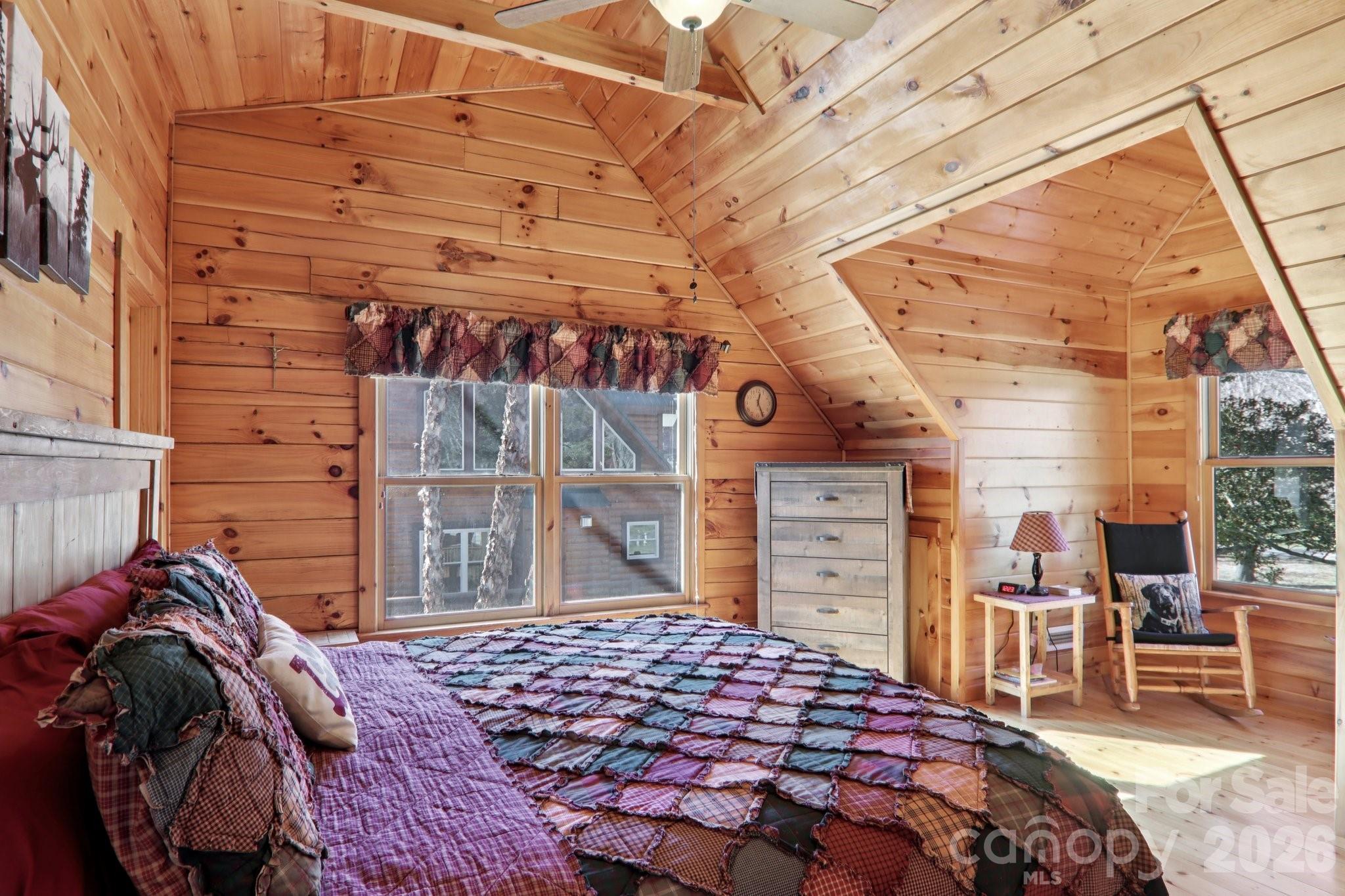 54 Meandering Way Maggie Valley, NC 28751 - Photo 21 of 47 a bedroom with a bed and a dresser