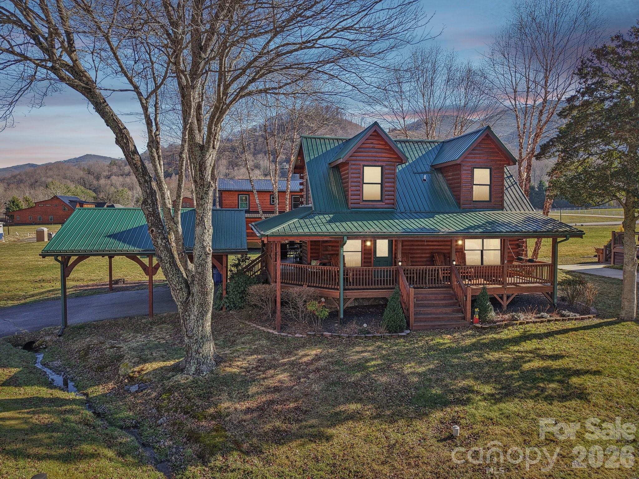 54 Meandering Way Maggie Valley, NC 28751 - Photo 44 of 47 a view of a house with a yard