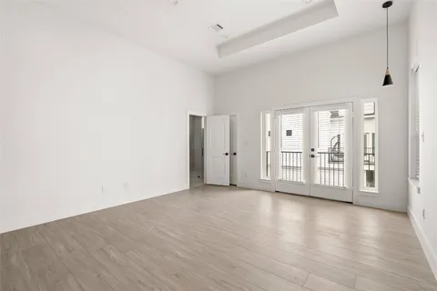 a view of a livingroom with wooden floor