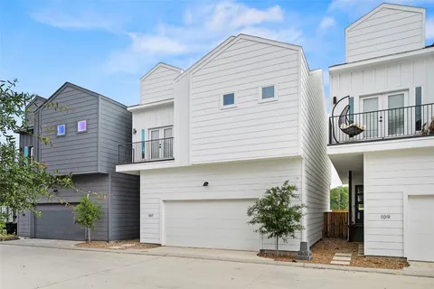 a front view of a house with a garage