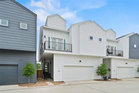 a front view of a house with a garage