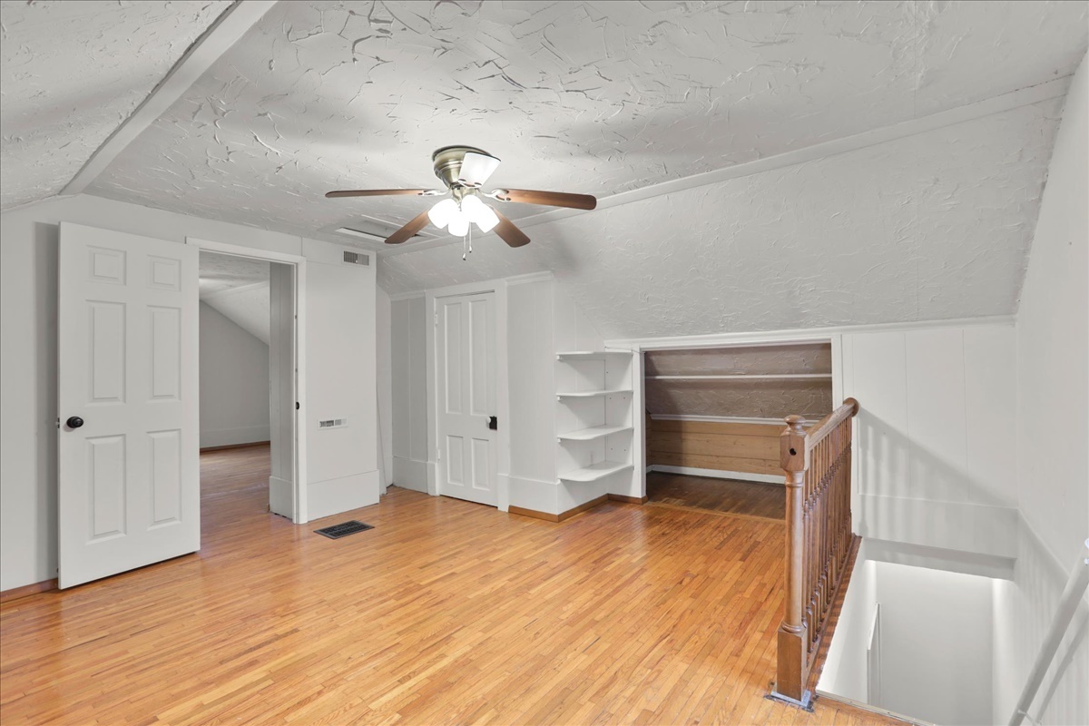 712 Bell Street Bloomington, IL 61701 - Photo 10 of 14 a view of empty room with wooden floor