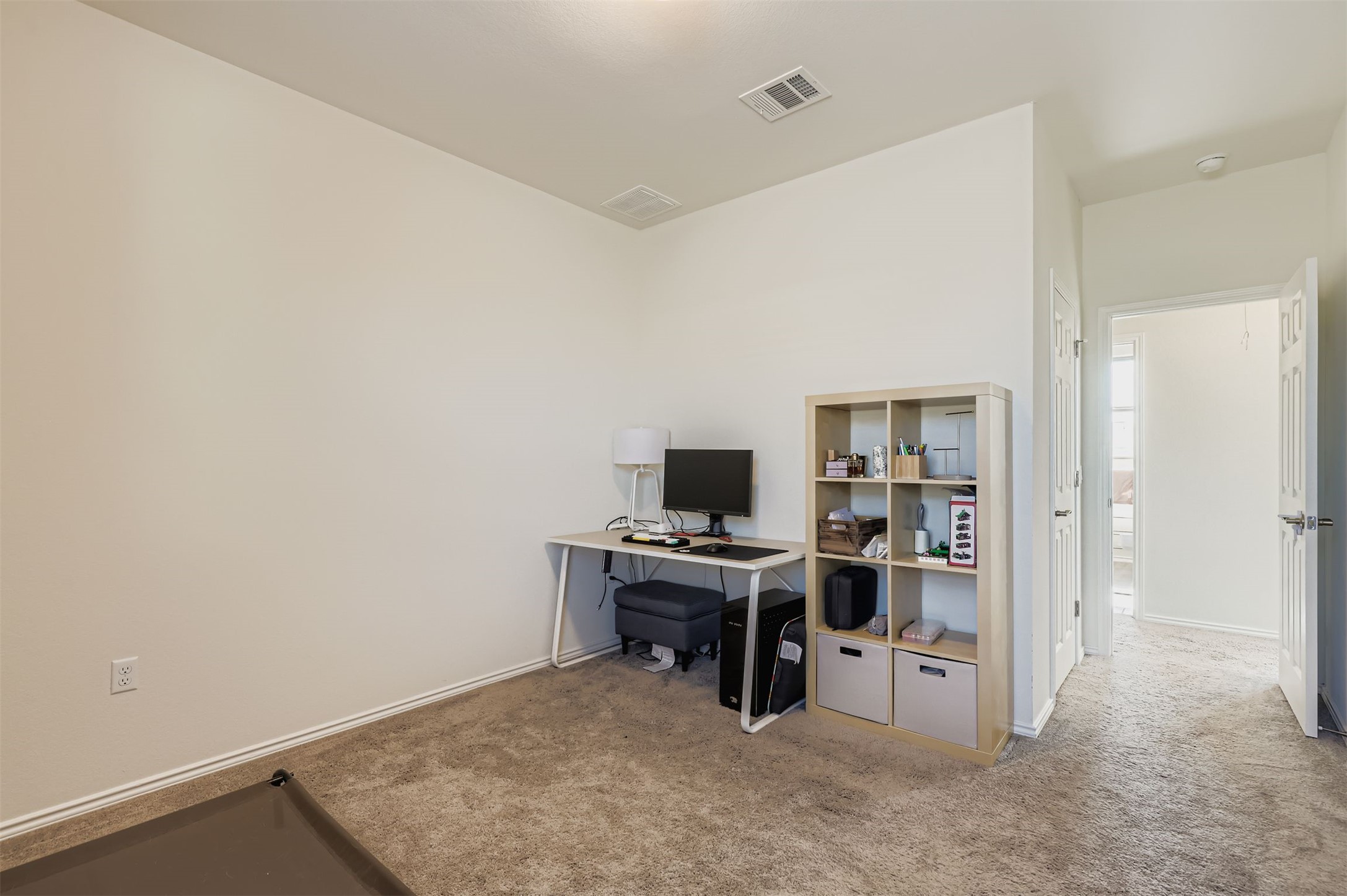15203 Wallaby Way Austin, TX 78728 - Photo 17 of 26 a view of a workspace with furniture