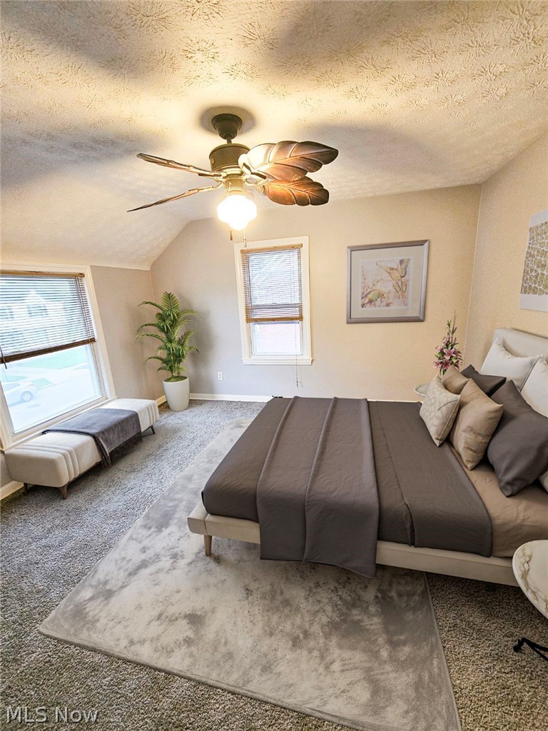 3741 Grosvenor Road Cleveland, OH 44118 - Photo 27 of 32 Unfurnished bedroom featuring a textured ceiling, carpet floors, and ceiling fan