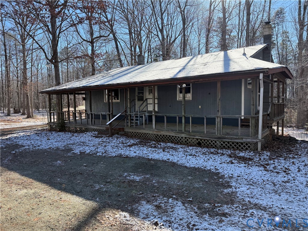 360 Clinton Road Cumberland, VA 23040 - Photo 1 of 33 View of front of house featuring a chimney and a p