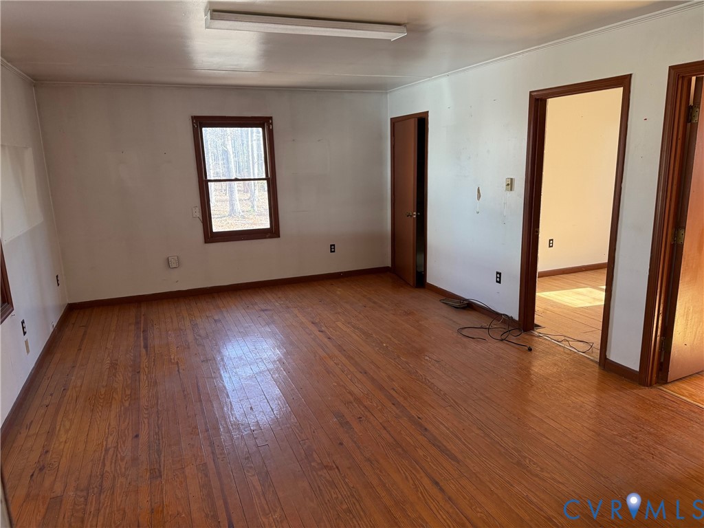 360 Clinton Road Cumberland, VA 23040 - Photo 17 of 33 Unfurnished bedroom with wood-type flooring and ba