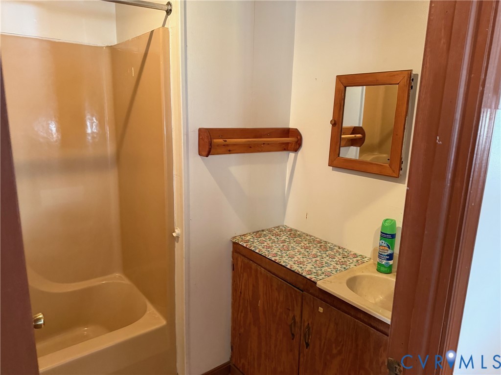 360 Clinton Road Cumberland, VA 23040 - Photo 25 of 33 Bathroom with vanity and shower / tub combination