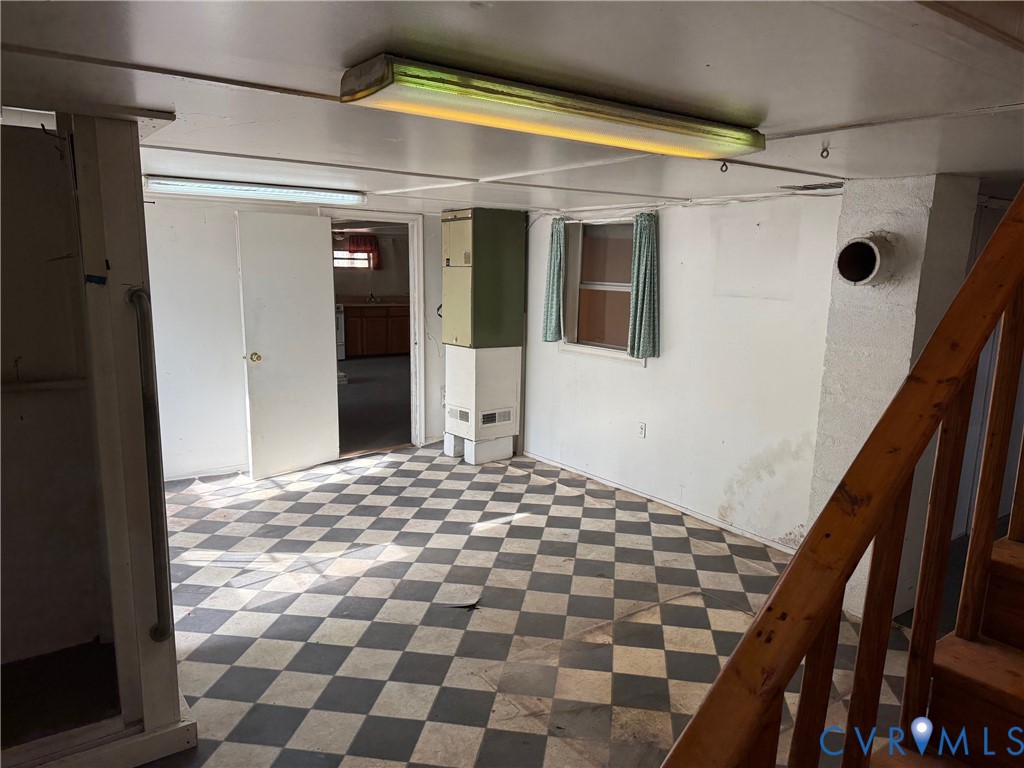360 Clinton Road Cumberland, VA 23040 - Photo 28 of 33 Unfinished basement with light flooring