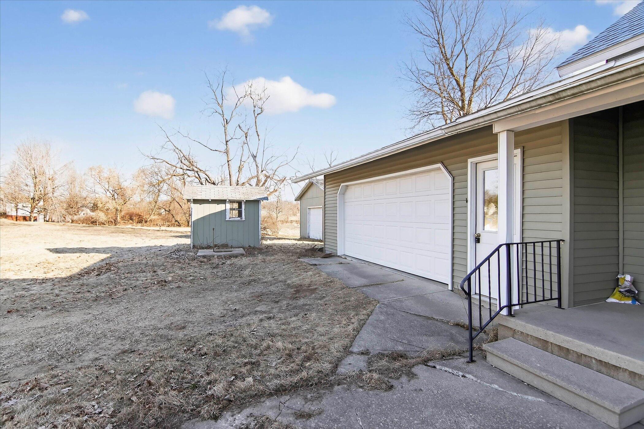 9758 Slee Road Onsted, MI 49265 - Photo 48 of 49 48-9758-Slee-Rd-Onsted-MI-49265-WindowSt