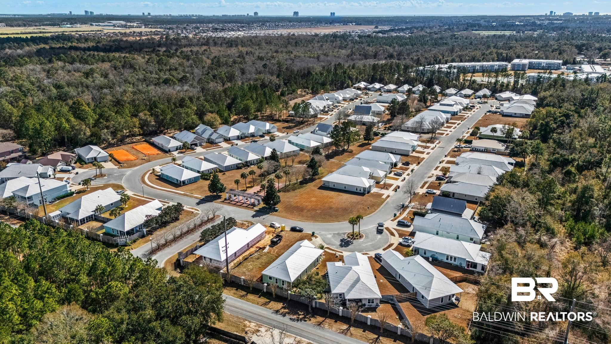 8013 Carmel Circle Foley, AL 36535 - Photo 44 of 49 Aerial overview of property's location featuring nearby suburban area and a forest