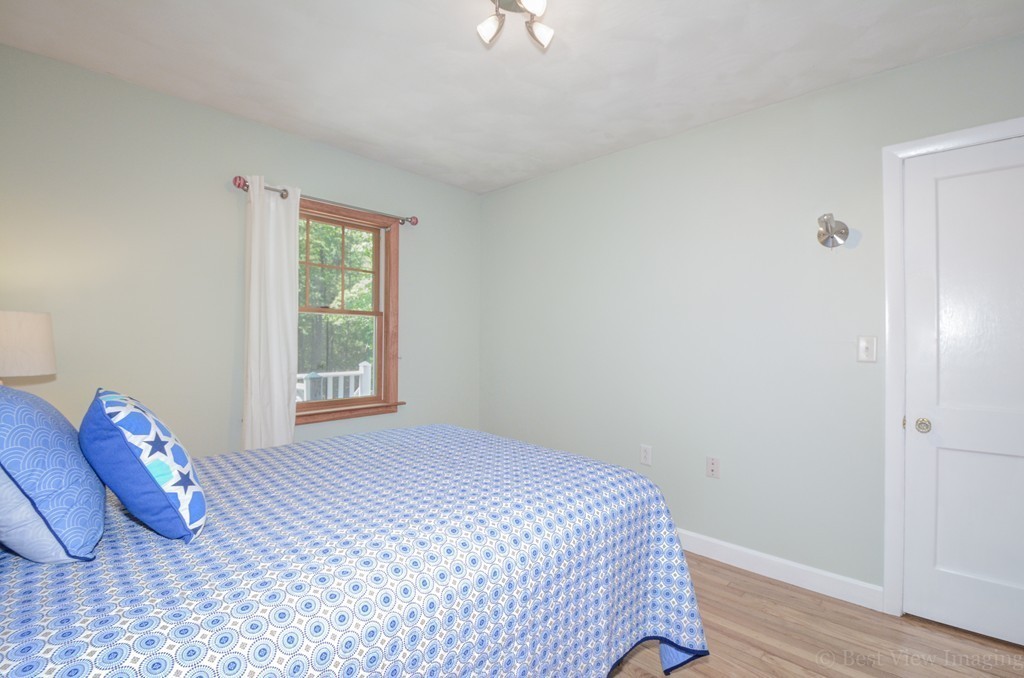 32 Old Shirley Road Harvard, MA 01451 - Photo 13 of 23 a bedroom with a bed and a window