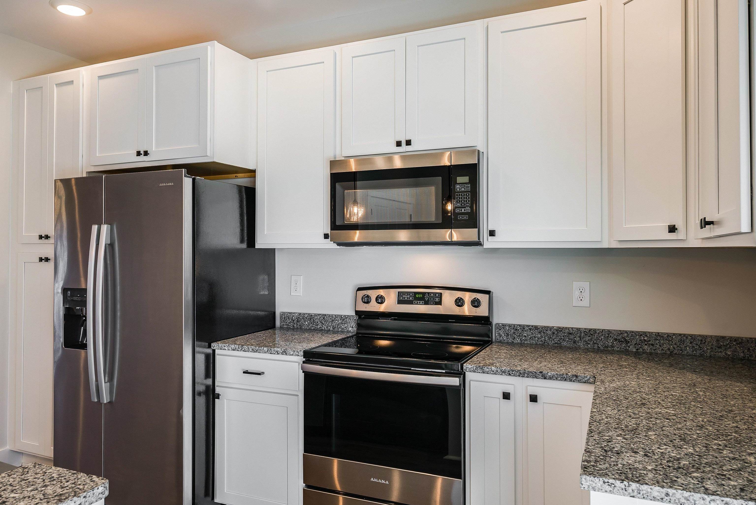 5 Barnyard Circle Bridgewater, VA 22812 - Photo 12 of 75 a kitchen with stainless steel appliances granite countertop a stove a refrigerator and a microwave