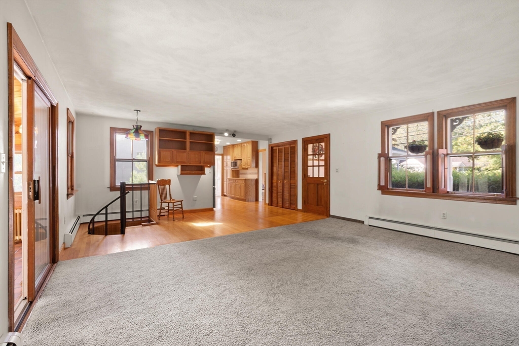 214 Graniteville Road Chelmsford, MA 01824 - Photo 16 of 42 an empty room with furniture and windows