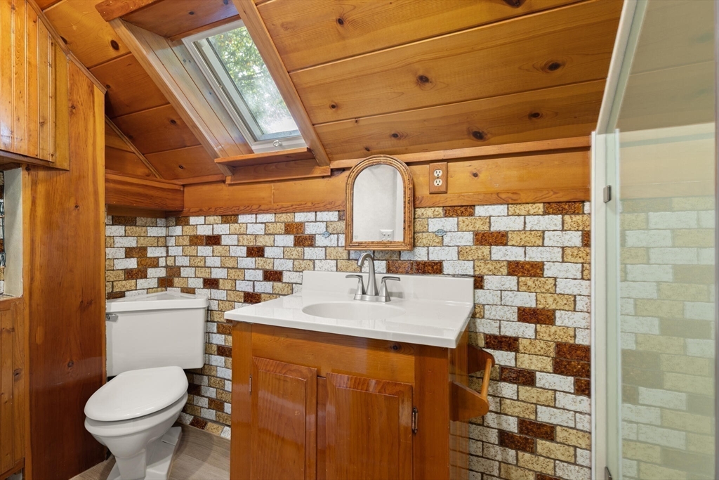 214 Graniteville Road Chelmsford, MA 01824 - Photo 30 of 42 a bathroom with a sink toilet and shower