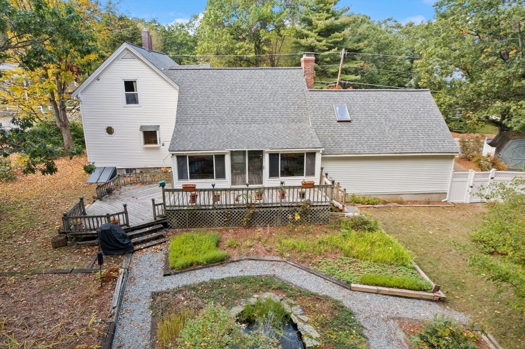 214 Graniteville Road Chelmsford, MA 01824 - Photo 34 of 42 a aerial view of a house with swimming pool next to a yard