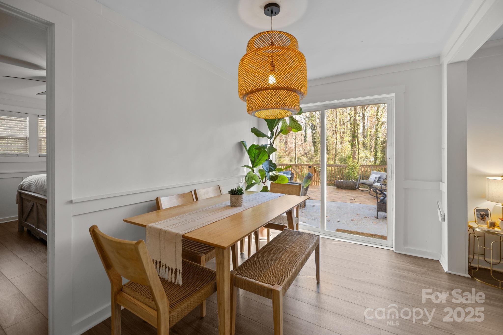 5509 Southampton Road Charlotte, NC 28217 - Photo 20 of 35 a view of a dining room with furniture window and wooden floor