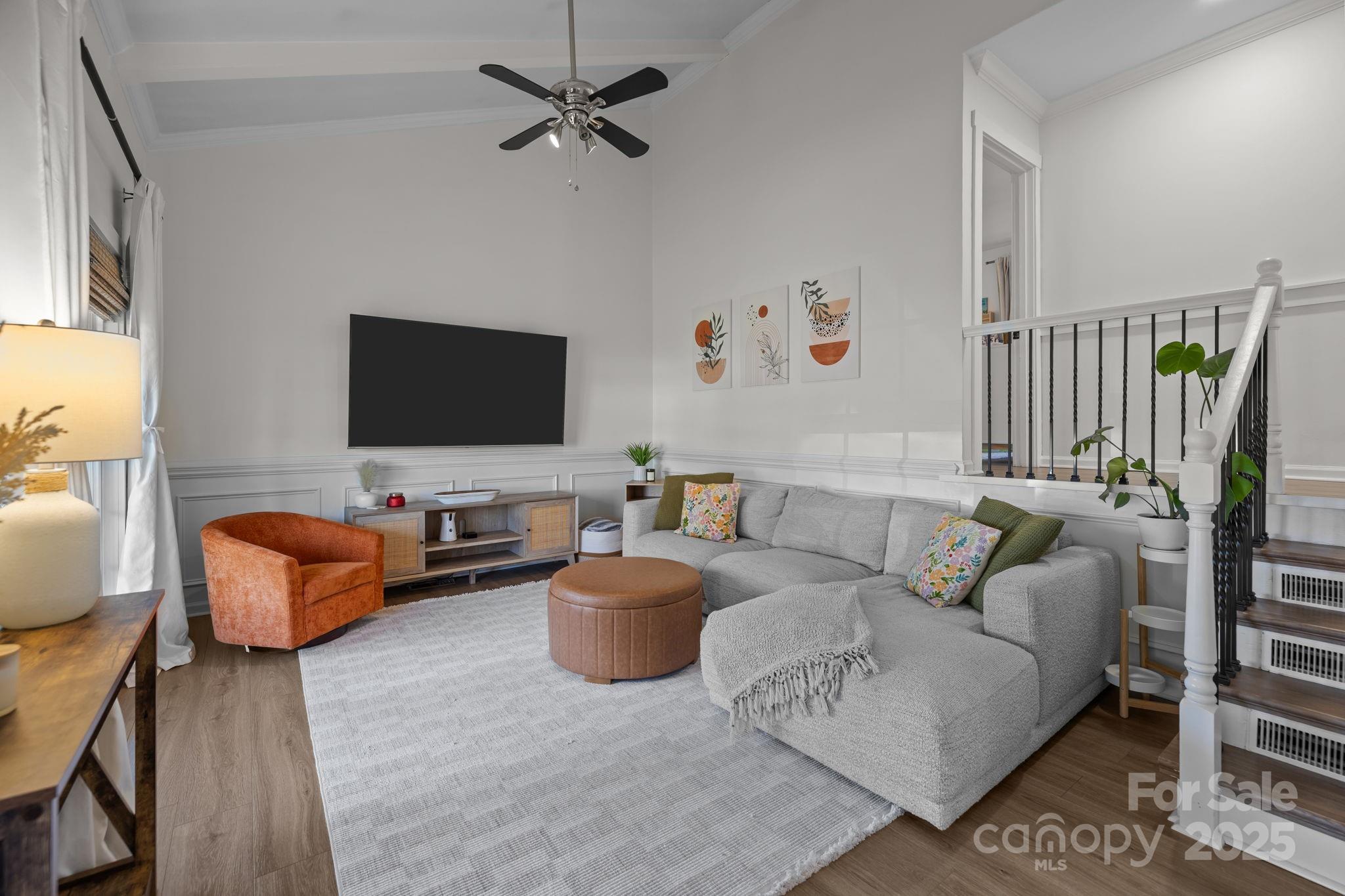 5509 Southampton Road Charlotte, NC 28217 - Photo 5 of 35 a living room with furniture and a flat screen tv