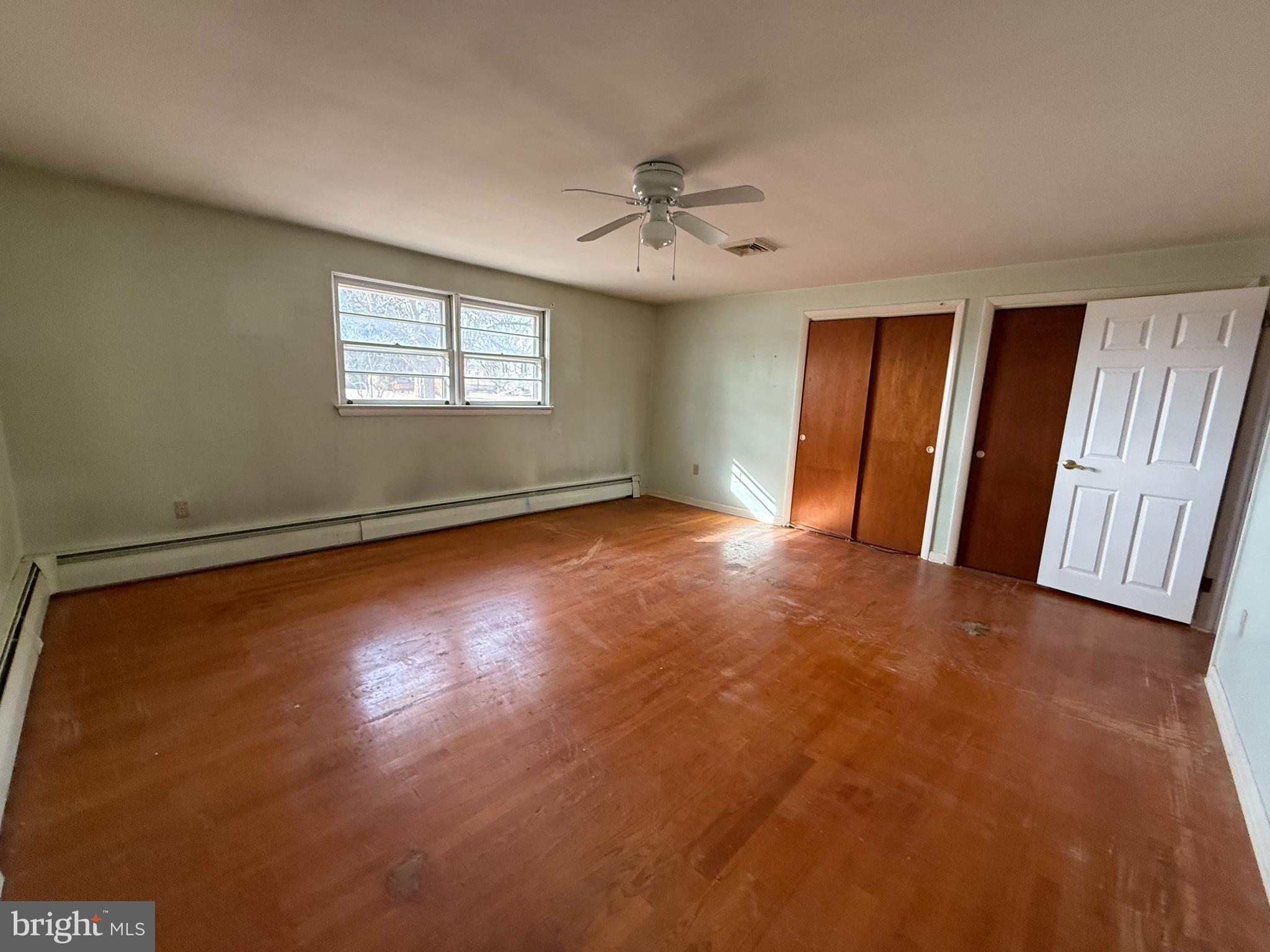 175 West Branch Road Barto, PA 19504 - Photo 11 of 17 an empty room with windows and fan