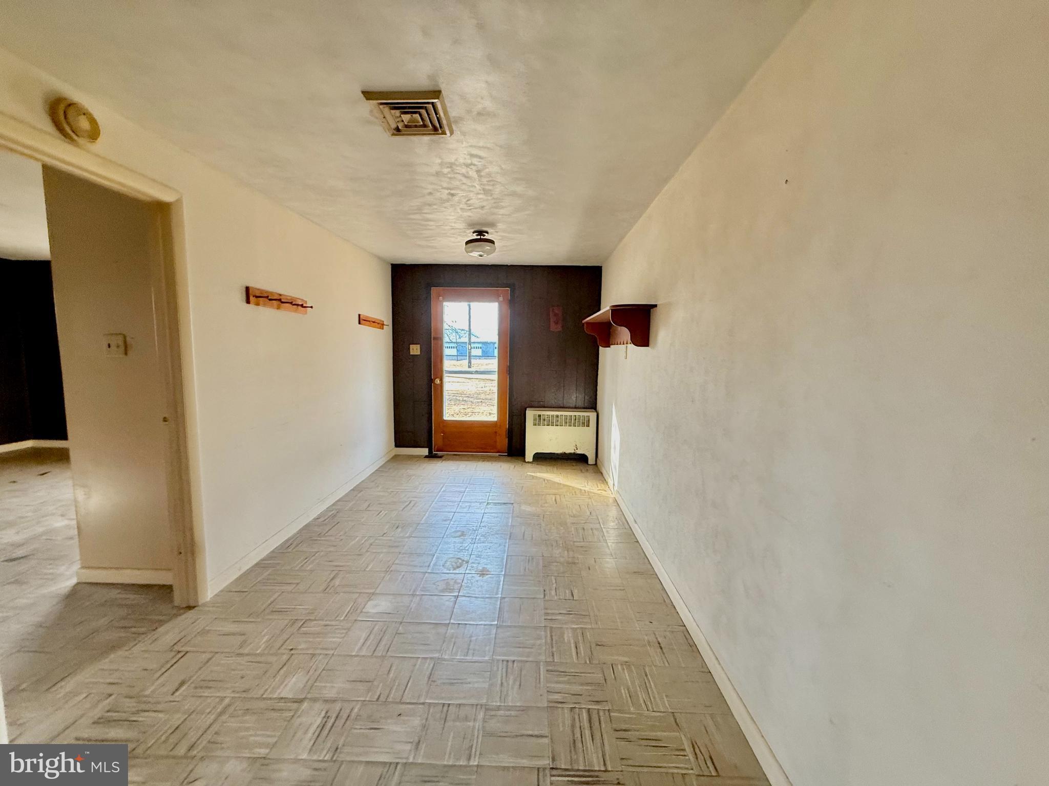 175 West Branch Road Barto, PA 19504 - Photo 13 of 17 a view of a hallway with wooden floor and a living room