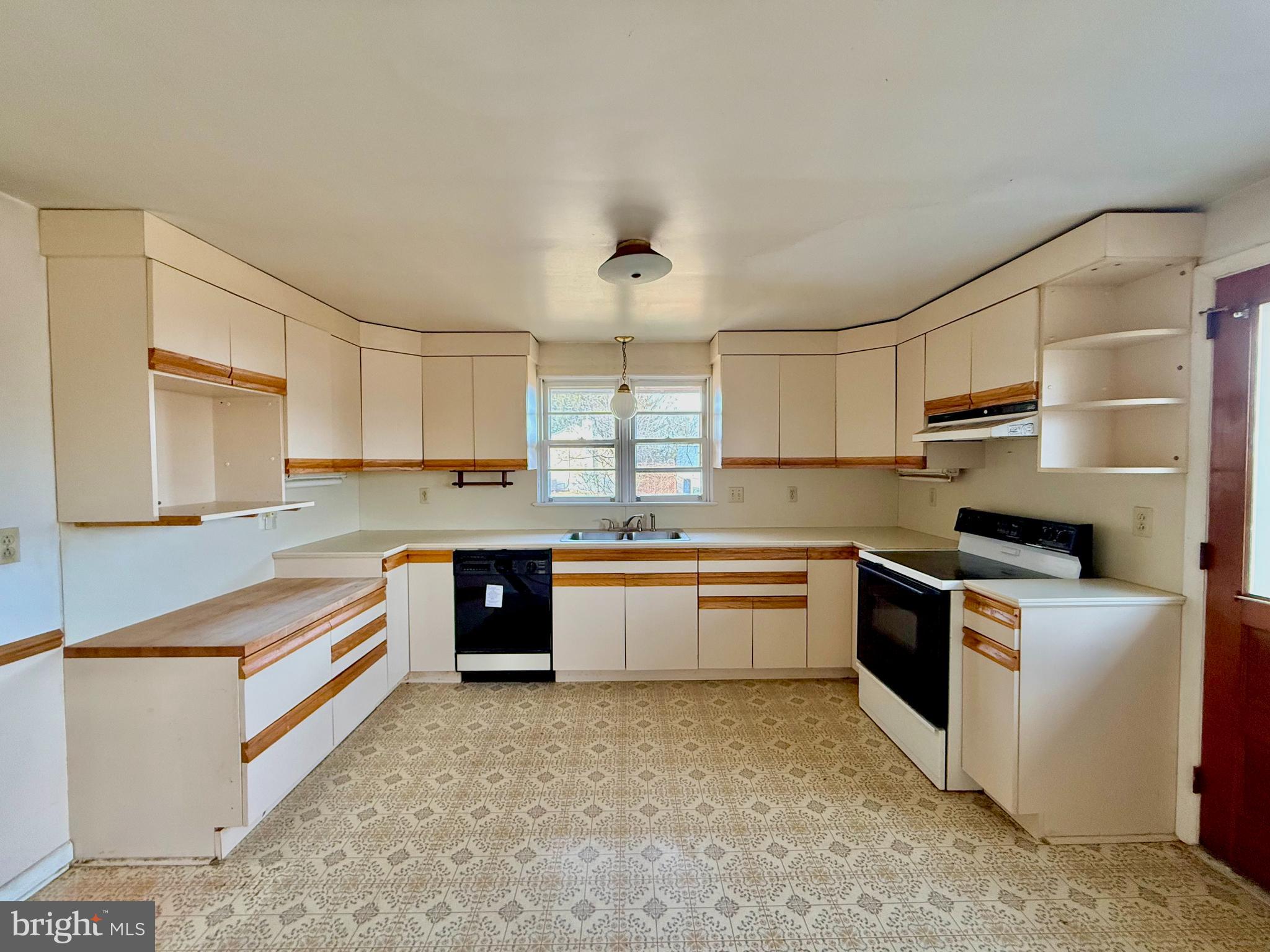 175 West Branch Road Barto, PA 19504 - Photo 5 of 17 a kitchen with stainless steel appliances granite countertop a stove sink and cabinets