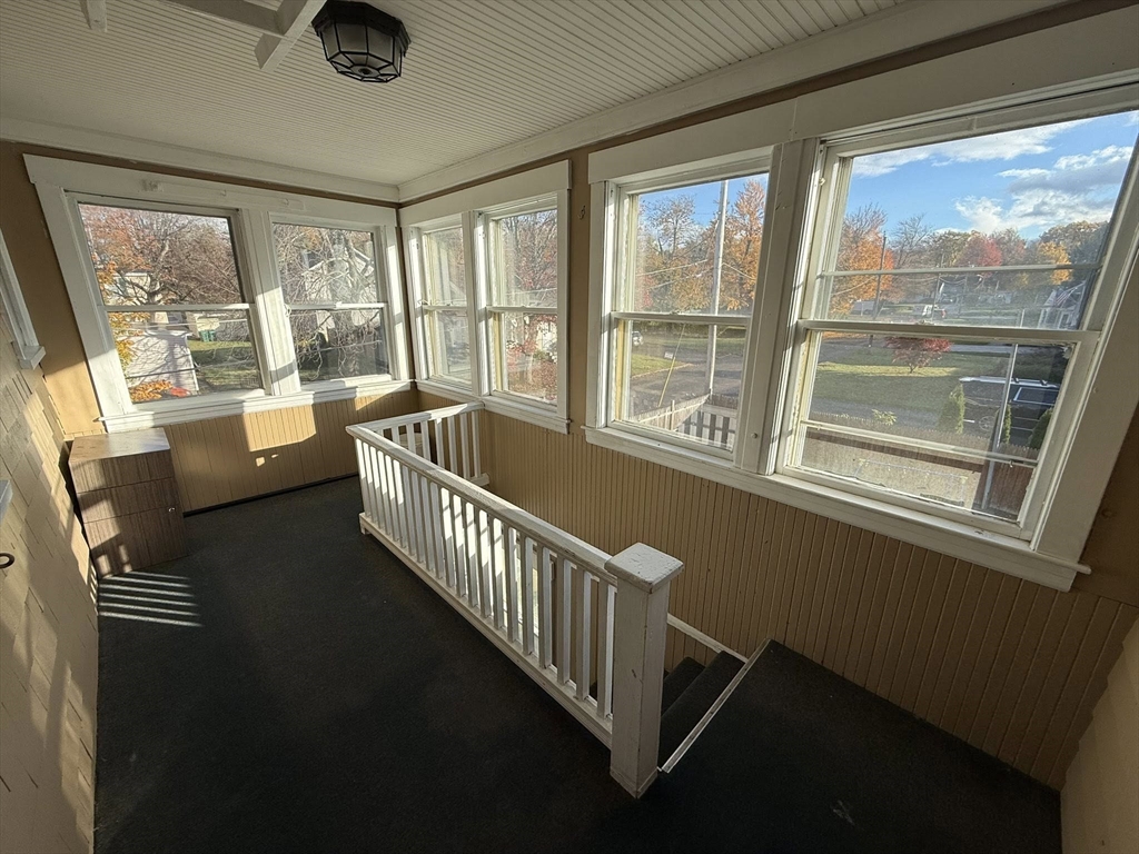 306 Franklin Road, Unit 2 Fitchburg, MA 01420 - Photo 15 of 17 a view of a hallway with windows