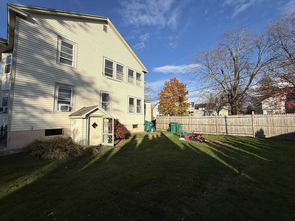 306 Franklin Road, Unit 2 Fitchburg, MA 01420 - Photo 17 of 17 a front view of a house with a yard