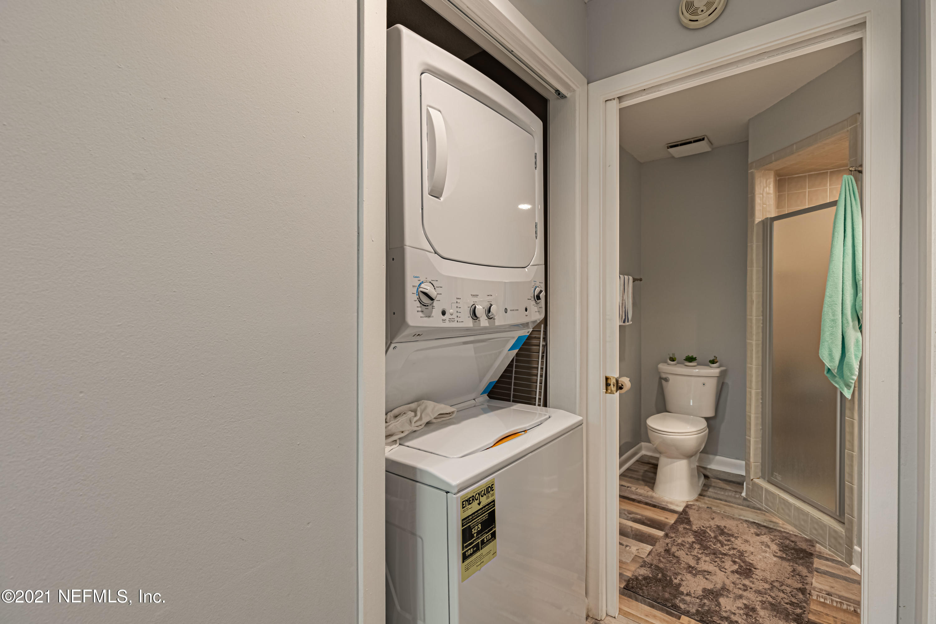 3155 Ravines Road, Unit 3502 Middleburg, FL 32068 - Photo 19 of 25 a bathroom with a toilet a sink and shower