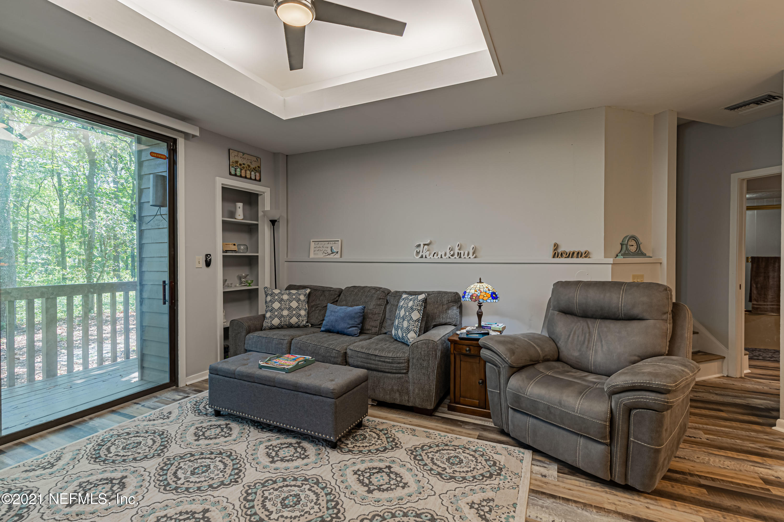 3155 Ravines Road, Unit 3502 Middleburg, FL 32068 - Photo 9 of 25 a living room with furniture and a window