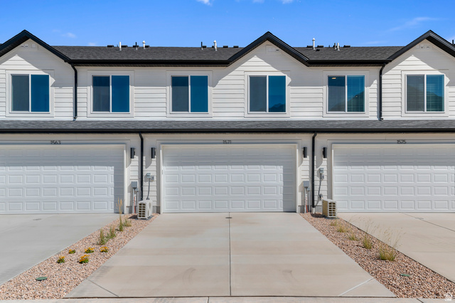 1851 East Corriente Drive, Unit 1166 Salem, UT 84653 - Photo 14 of 16 Traditional home with a garage, a shingled roof, and driveway