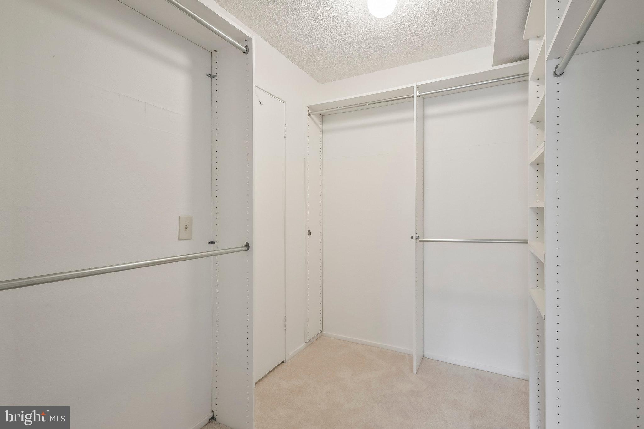 6101 Edsall Road, Unit 712 Alexandria, VA 22304 - Photo 28 of 53 a view of an empty walk in closet