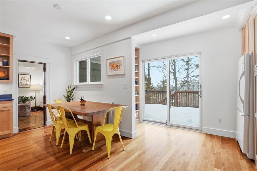 30 York Terrace Brookline, MA 02446 - Photo 12 of 39 a view of a dining room with furniture window and wooden floor