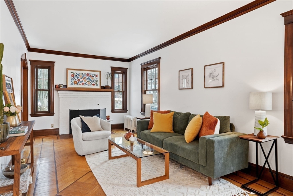 30 York Terrace Brookline, MA 02446 - Photo 15 of 39 a living room with furniture and a potted plant
