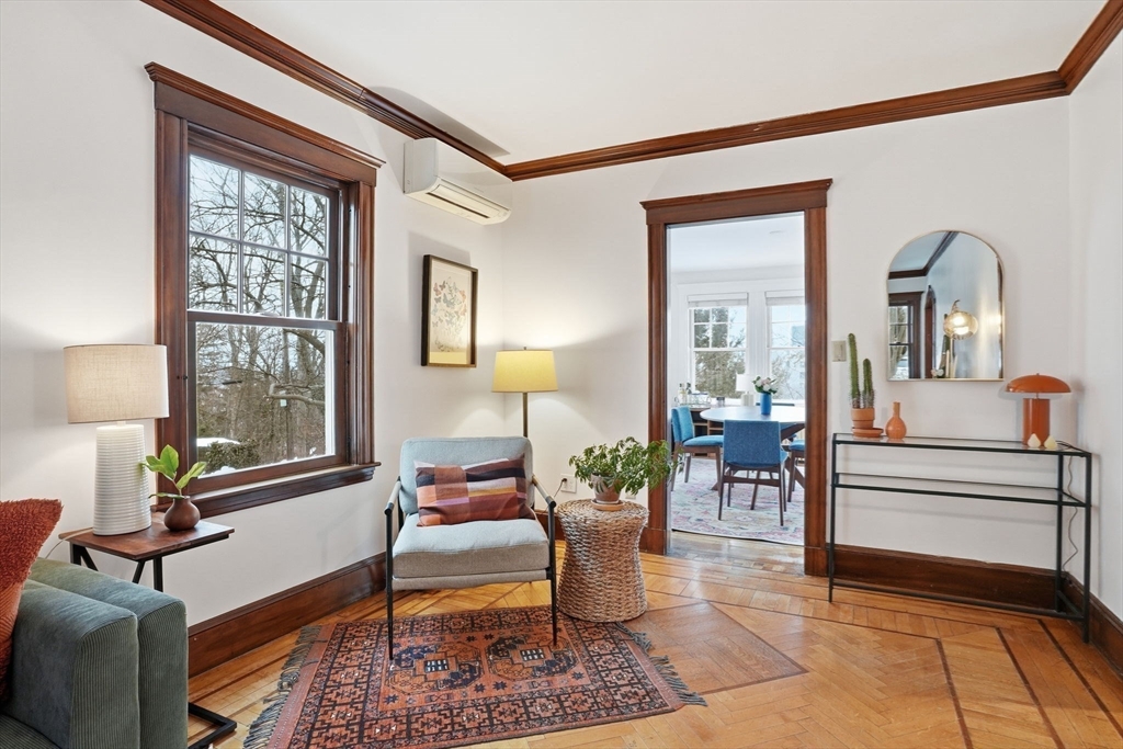 30 York Terrace Brookline, MA 02446 - Photo 17 of 39 a living room with furniture and a large window
