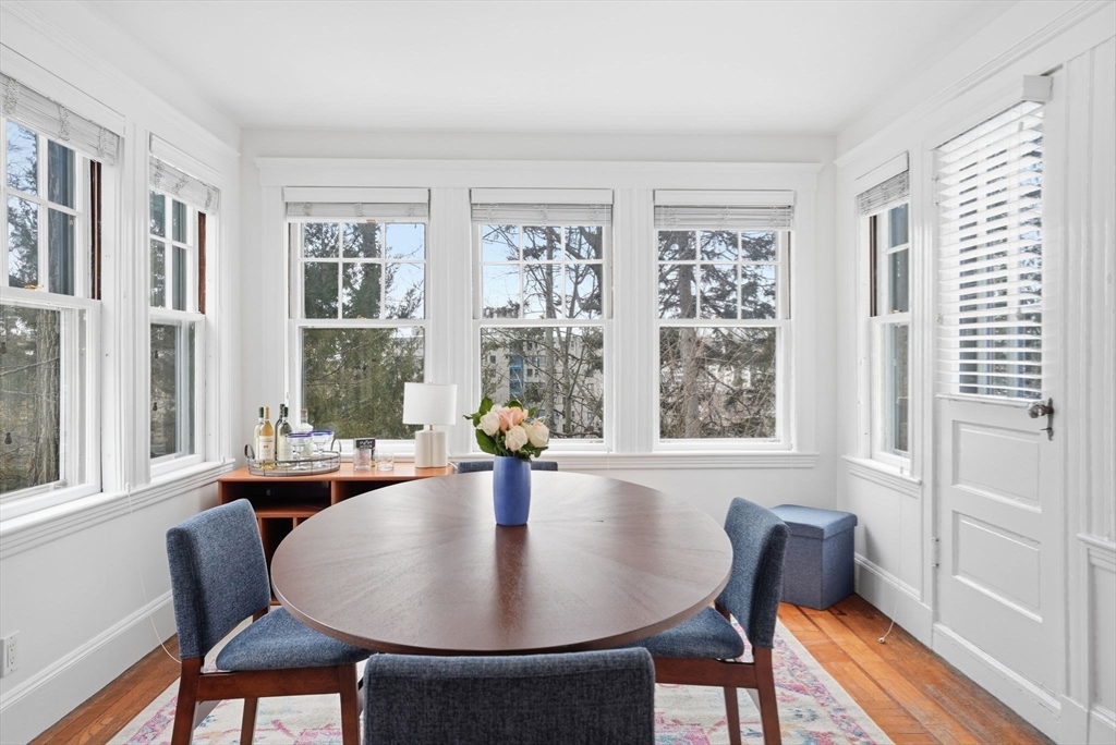 30 York Terrace Brookline, MA 02446 - Photo 19 of 39 a dining room with furniture a rug and wooden floor