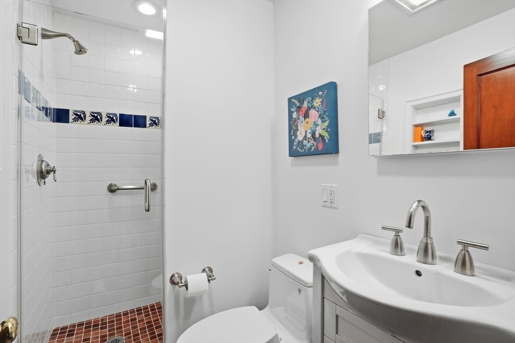 30 York Terrace Brookline, MA 02446 - Photo 21 of 39 a bathroom with a sink toilet and shower
