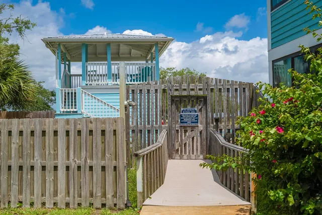 a view of a swimming pool with a yard