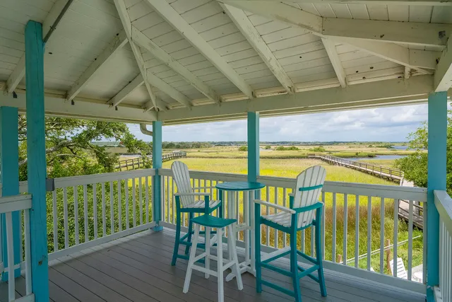 a view of swimming pool with seating area