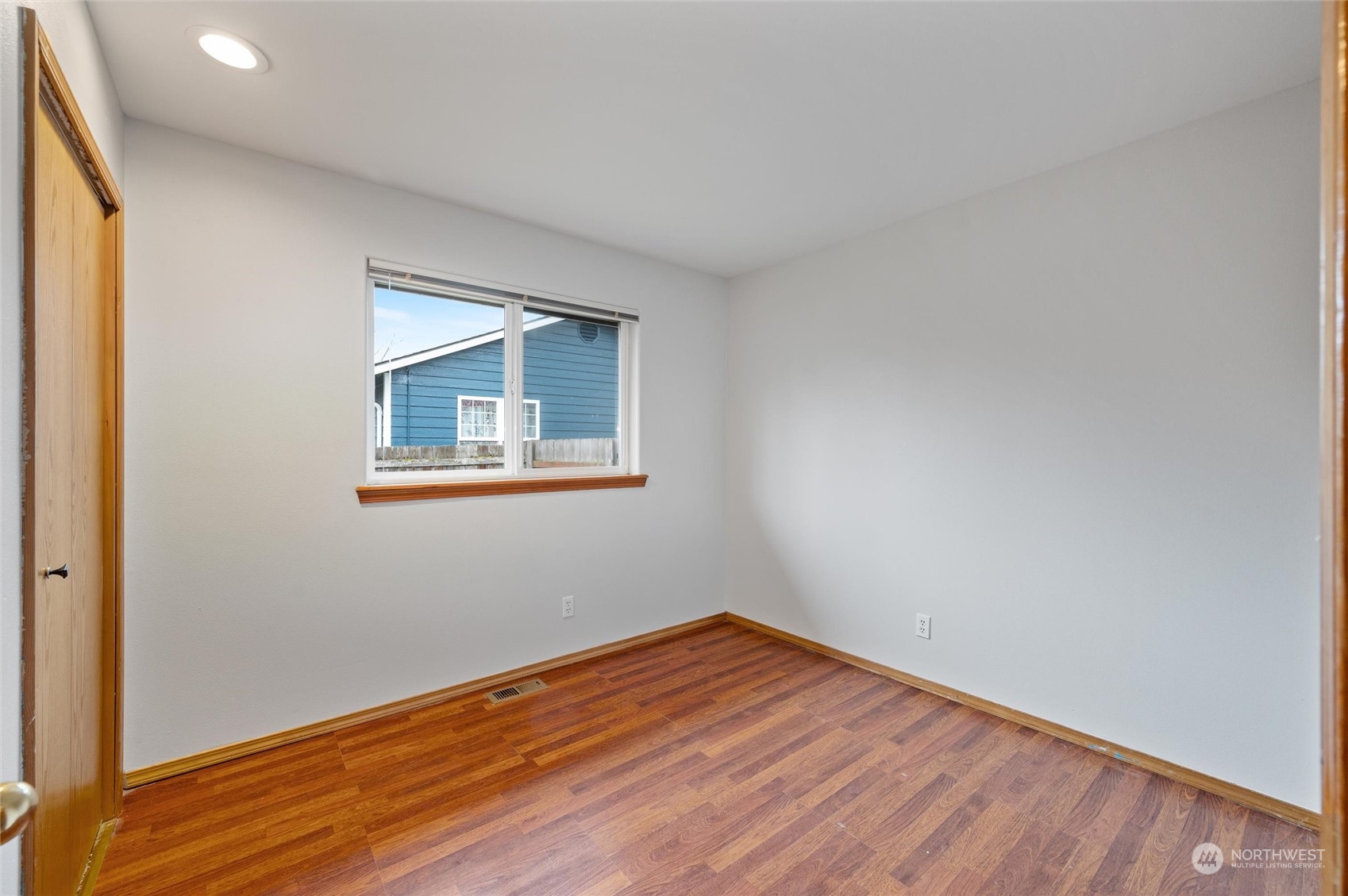 1356 Roma Road Bellingham, WA 98226 - Photo 31 of 39 a view of empty room with wooden floor and fan