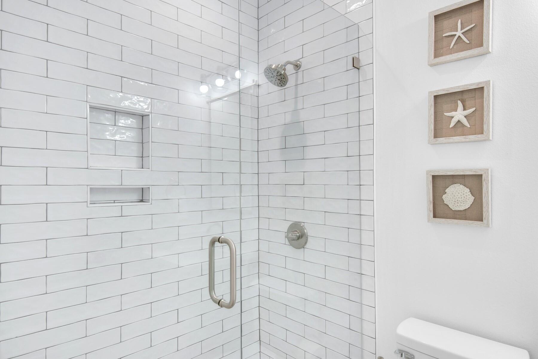 4543 Luke Avenue Destin, FL 32541 - Photo 29 of 45 a bathroom with a shower