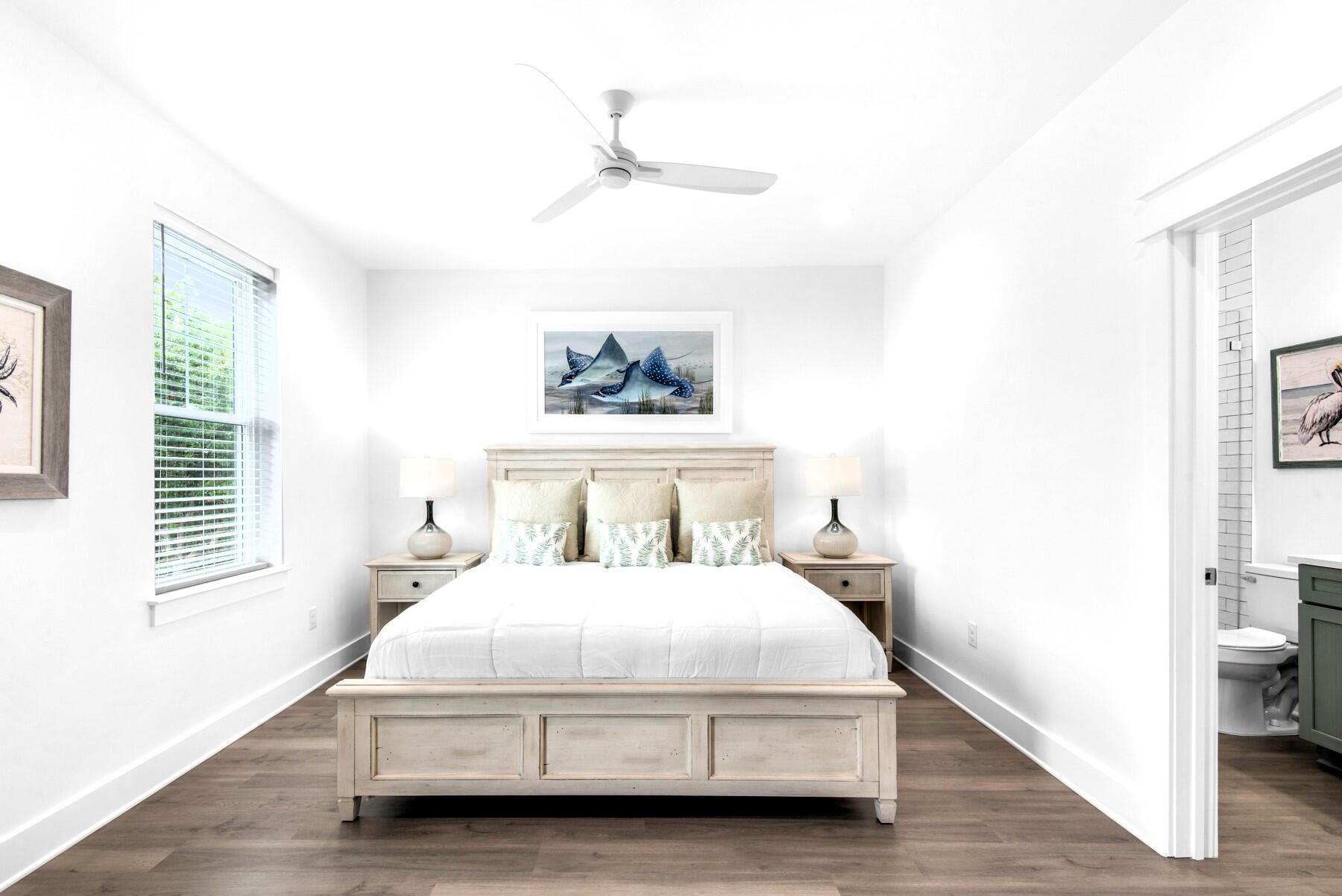 4543 Luke Avenue Destin, FL 32541 - Photo 33 of 45 a bedroom with a bed and a window