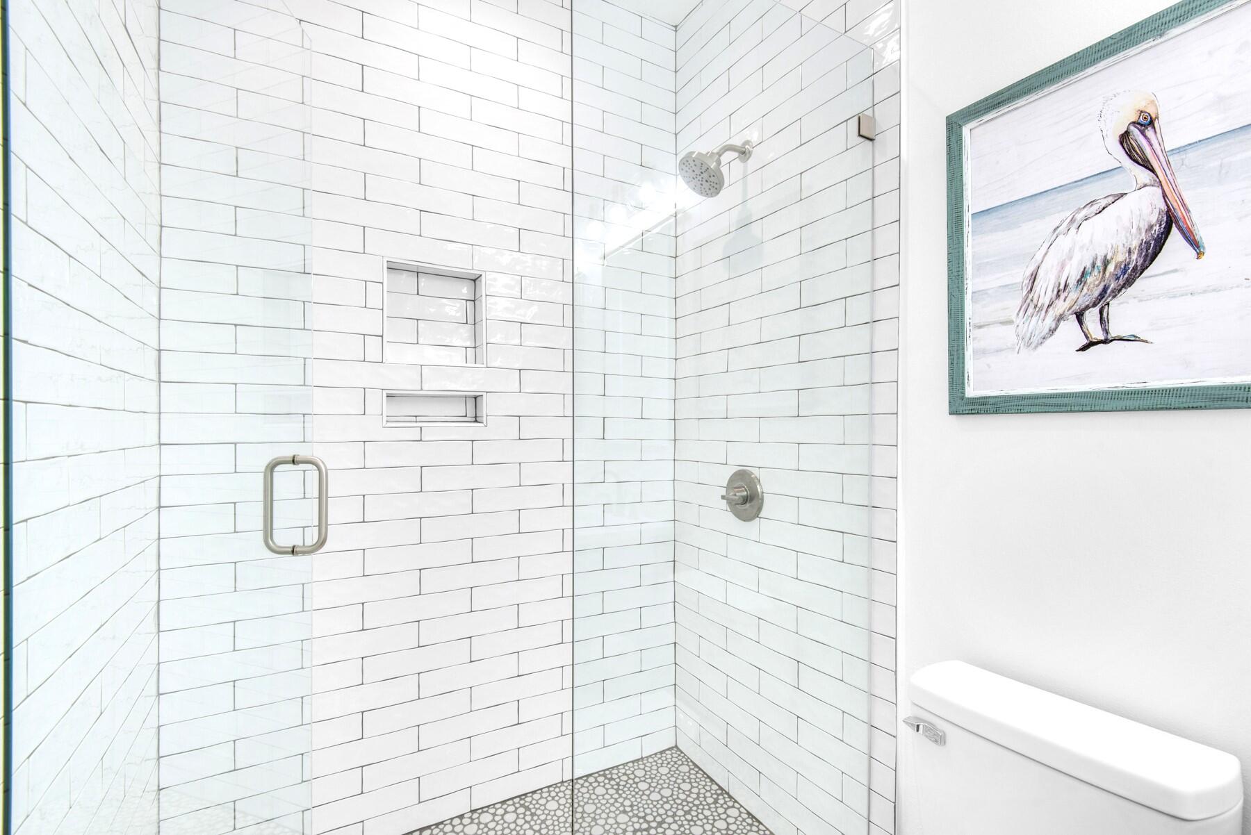 4543 Luke Avenue Destin, FL 32541 - Photo 36 of 45 a bathroom with a shower