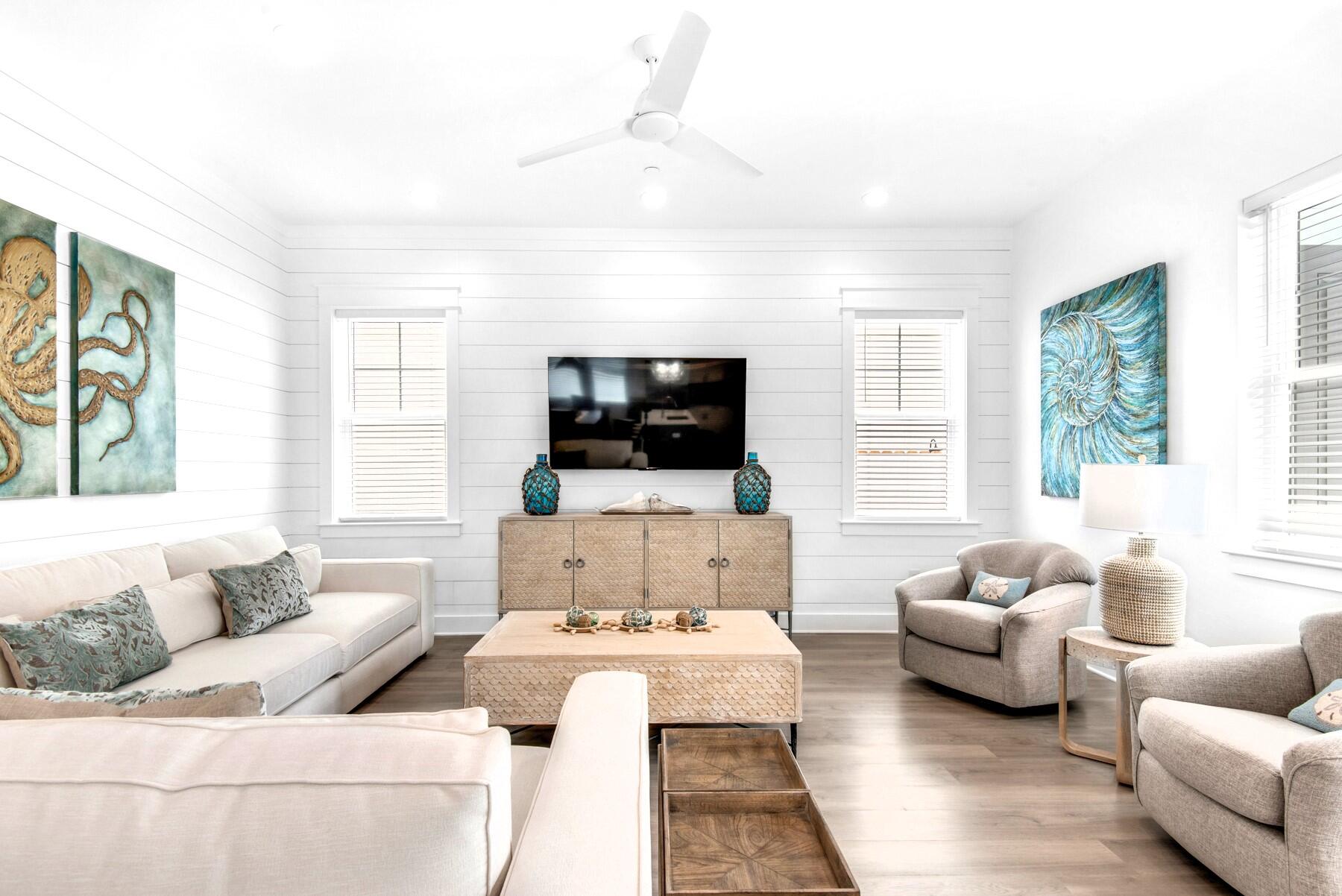 4543 Luke Avenue Destin, FL 32541 - Photo 9 of 45 a living room with furniture and a flat screen tv