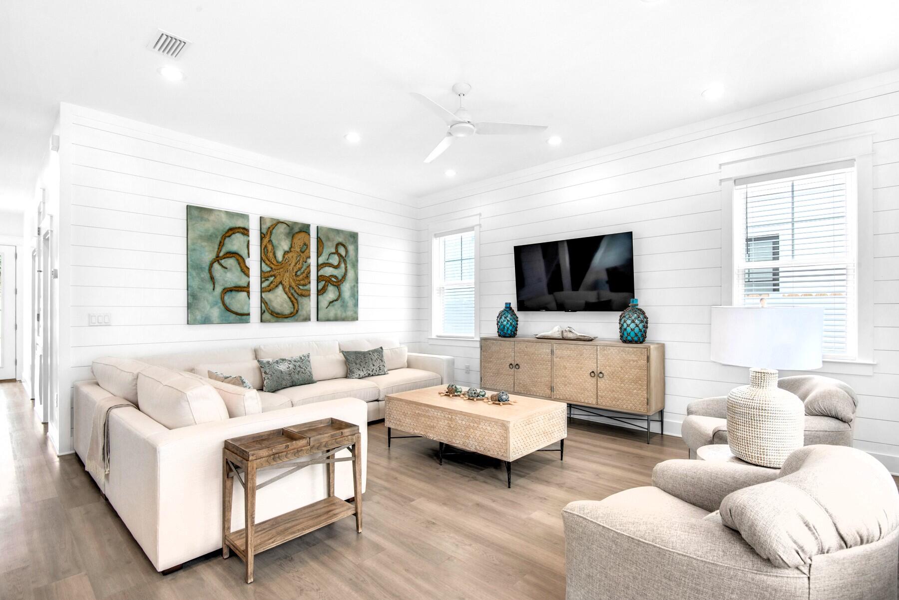 4543 Luke Avenue Destin, FL 32541 - Photo 10 of 45 a living room with furniture and a flat screen tv