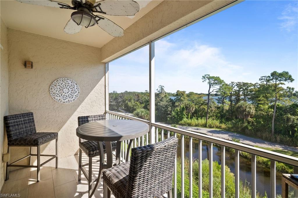 4455 Botanical Pl Circle, Unit 405 Naples, FL 34112 - Photo 3 of 46 a view of a balcony with furniture