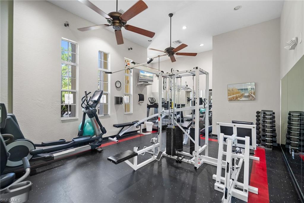 4455 Botanical Pl Circle, Unit 405 Naples, FL 34112 - Photo 32 of 46 a view of a room with gym equipment