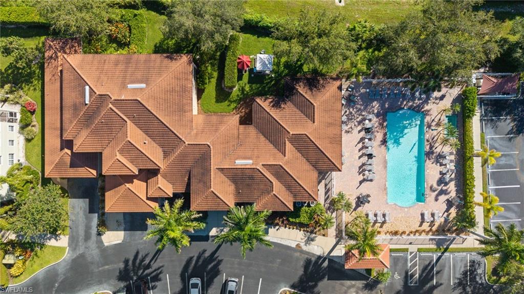 4455 Botanical Pl Circle, Unit 405 Naples, FL 34112 - Photo 40 of 46 an aerial view of a house