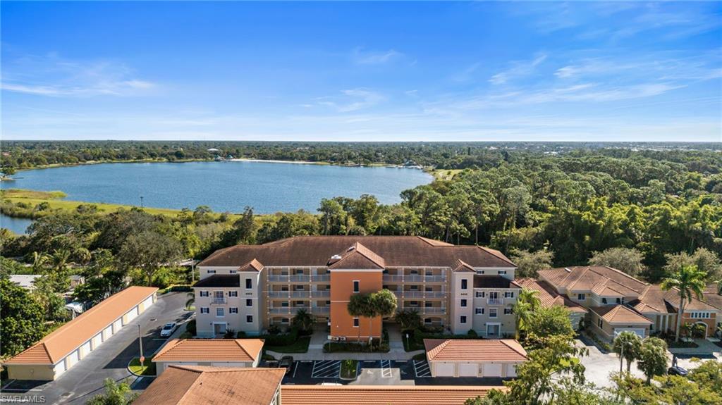 4455 Botanical Pl Circle, Unit 405 Naples, FL 34112 - Photo 43 of 46 an aerial view of a house